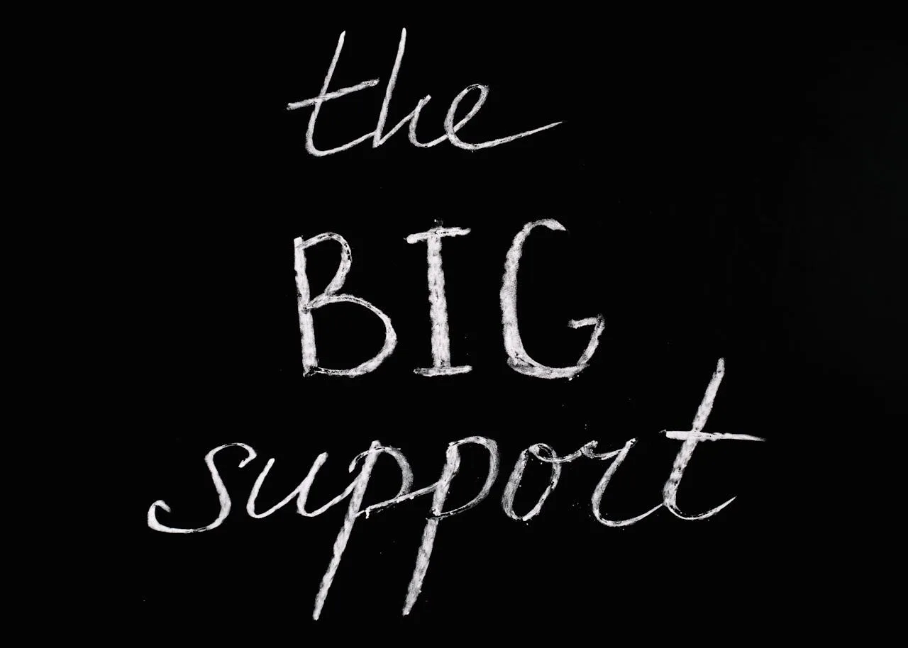 services-02 Chalkboard background featuring the motivational phrase 'The Big Support' in white chalk.